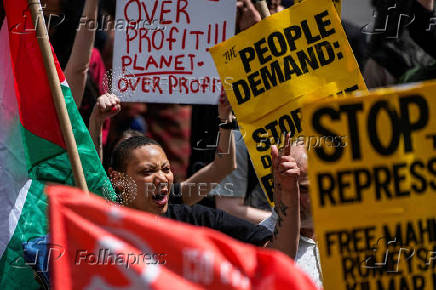 Protestors march during a May Day rally in New York