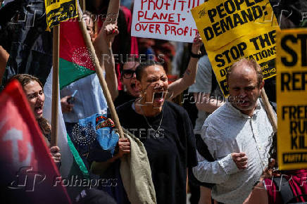 Protestors march during a May Day rally in New York