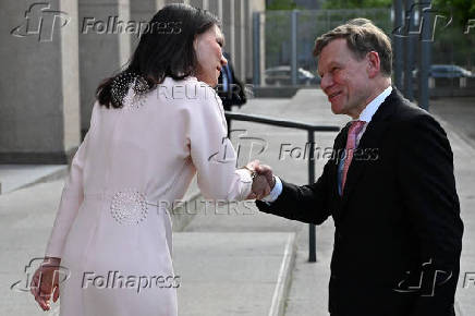 Outgoing German Foreign Minister Baerbock welcomes her successor, newly appointed German Foreign Minister Wadephul prior a handover ceremony in Berlin