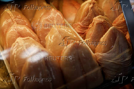 Chicken is displayed in a fridge in a market in Sao Paulo