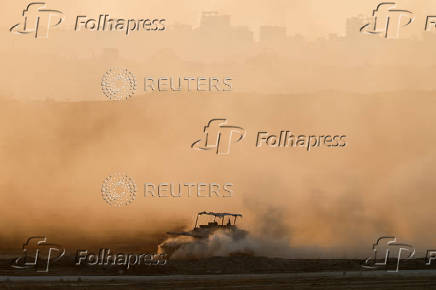 An Israeli tank manoeuvres in Gaza