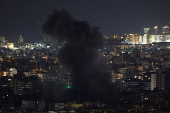 Israeli strike on Beirut's southern suburbs, after the Israeli military issued an evacuation warning for the area, as seen from Baabda