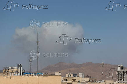 Smoke rises following an Israeli attack in Tehran