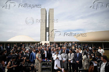 Brazilian lawmakers who support former President Jair Bolsonaro hold a press conference, in Brasilia