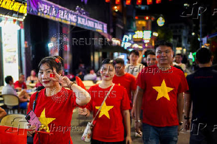 People spend their evening at Hanoi's Old Quarter, in Hanoi