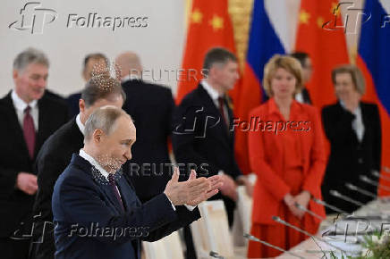 Russian President Putin and Chinese President Xi meet in Moscow
