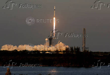 FILE PHOTO: SpaceX's Falcon 9 rocket lifts off, carrying NASA's Crew-10 astronauts to the International Space Station
