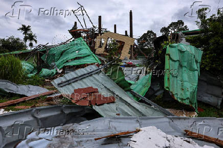 A house damaged by Cambodia's shelling is pictured in Sisaket province, ahead of a ceasefire talks in Malaysia on the deadly border conflict between Thailand and Cambodia