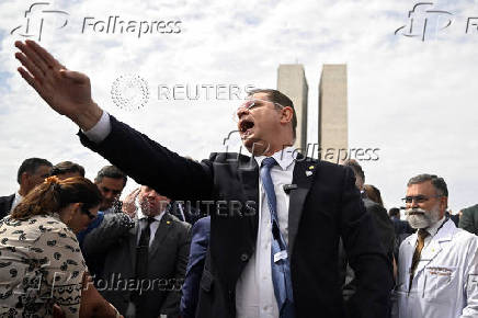 Brazilian lawmakers who support former President Jair Bolsonaro hold a press conference, in Brasilia