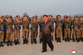 North Korea's Kim oversees air drills