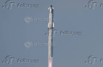 SpaceX's next-generation Starship spacecraft atop its Super Heavy booster is prepared for launch