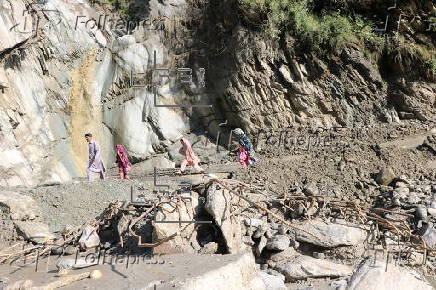 Several people dead in Pakistan-administered Kashmir following storms and landslides