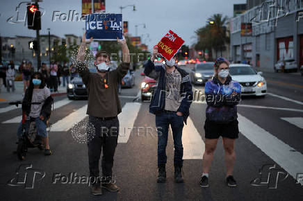 Protesters gather around the Los Angeles Federal Building after multiple detentions by ICE, in Los Angeles