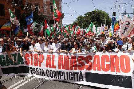 Pro-Palestinian protesters attend a demonstration calling for an end to the bombing in Gaza, in Rome