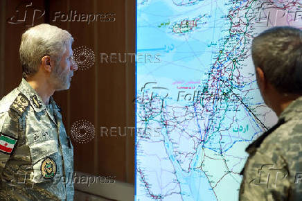 Iranian Army commander-in-chief Amir Hatami attends a meeting in the Iranian Army's War Command Room at an undisclosed location in Iran