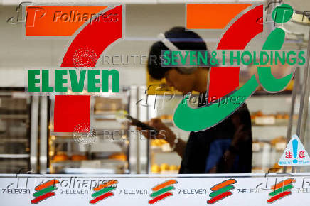 FILE PHOTO: FILE PHOTO: Japan's Seven & I?s logo is seen at its 7-Eleven convenience store in Tokyo