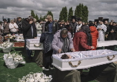 Ukraine bids farewell to three children killed in Russian attack in Zhytomyr region