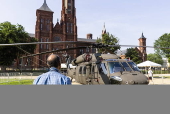 Helicopters and other heavy equipment staged for DC military parade