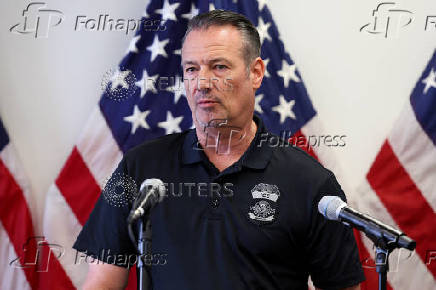 Acting Immigration and Customs Enforcement (ICE) director Todd Lyons attends a press conference, in Los Angeles