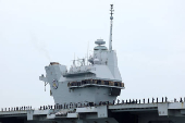 Britain's HMS Prince of Wales aircraft carrier arrives at Marina Bay Cruise Centre in Singapore
