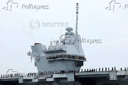 Britain's HMS Prince of Wales aircraft carrier arrives at Marina Bay Cruise Centre in Singapore