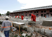 People work on the construction of a hotel ahead of the COP30 climate summit in Belem
