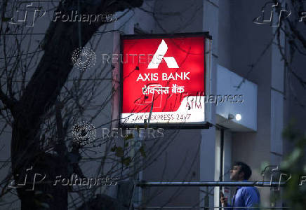 FILE PHOTO: FILE PHOTO: A man enters a branch of Axis Bank in New Delhi