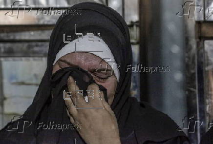 Palestinians mourn family killed in Israeli airstrike on Gaza refugee camp