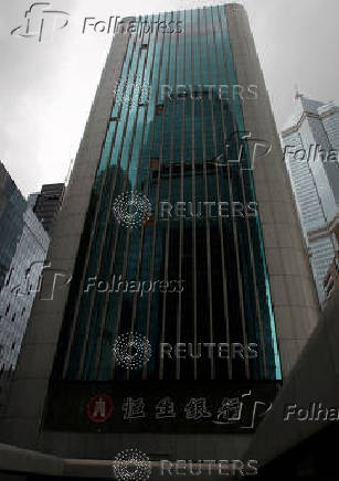 FILE PHOTO: Hang Seng Bank headquarters is seen with glass panels missing after Typhoon Nesat in the Central financial district of Hong Kong