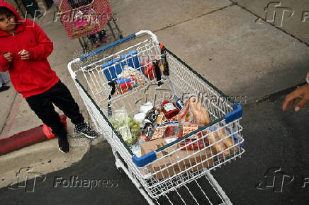 Food pantry is busy, weeks into the continuing U.S. government shutdown, in Commerce City