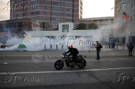 Protesters gather around the Los Angeles Federal Building after multiple detentions by ICE, in Los Angeles