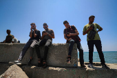 Palestinians attempt to access the internet using eSIMs, in Gaza City