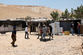 Palestinian Bedouins flee their homes, near Jericho
