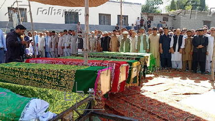 Mass funeral of 8 volunteers killed in a landslide near the Chinese border in Gilgit