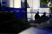 Polish police secure an earea at the Warsaw University after an attack with an axe