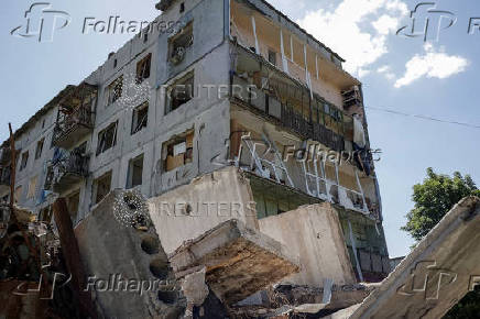 A view shows the apartment building damaged by Russian military strikes in the frontline town of Kostyantynivka