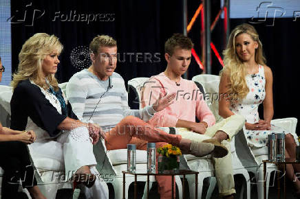 FILE PHOTO: Todd Chrisley speaks next to his wife Julie and their kids Chase and Savannah at a panel for the USA television series 