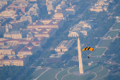 U.S. Army Golden Knights parachute team perform during the Twilight Tattoo ceremony