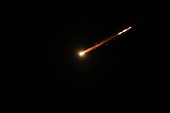 A missile launched from Iran is seen from Jerusalem