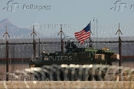 A U.S. Army Stryker armored vehicle guards the U.S.-Mexico border