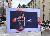 An advertisement featuring Caitlin Clark is displayed ahead of the WNBA All-Star Game, in Indianapolis