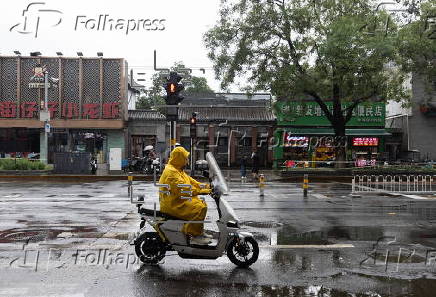 Daily life amid rain in Beijing