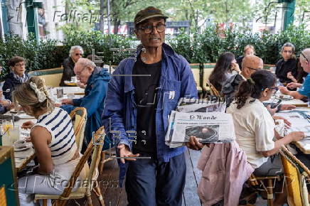 The last Newspaper Hawker in Paris to receive Order of Merit from President Macron