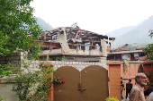 A damaged portion of Bilal Mosque is seen after it was hit by an Indian strike in Muzaffarabad