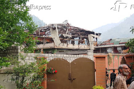 A damaged portion of Bilal Mosque is seen after it was hit by an Indian strike in Muzaffarabad