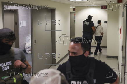 Federal Agents conduct arrests at the immigration court