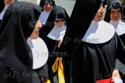 Spanish nuns walk in a group near the Vatican