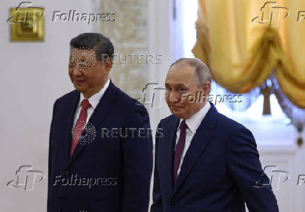 Russian President Putin and Chinese President Xi meet in Moscow