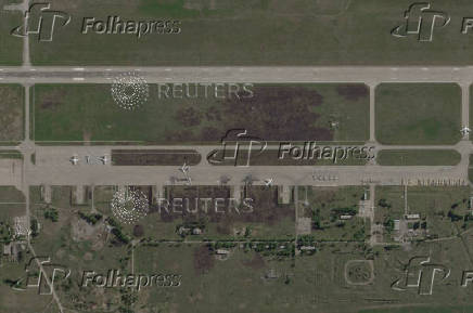 FILE PHOTO: Satellite view shows damaged planes and tarmac at Russian Belaya airfield