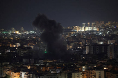 Israeli strike on Beirut's southern suburbs, after the Israeli military issued an evacuation warning for the area, as seen from Baabda